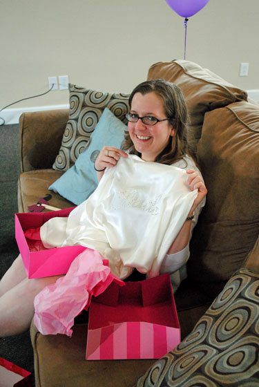 Allison opening gifts