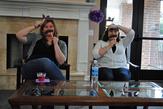 Stacy & Kelly playing Staches & Tiaras