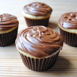 Cake Mix DoctorÂ®'s Yellow Cupcakes with Chocolate Fudge Marshmallow Frosting by So, How's It Taste? www.leah-claire.com